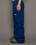 BUSI Biggie Pant Navy snowboard and ski pants, side view on model
