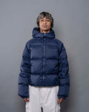 BUSI Puffer Jacket Navy down puffer jacket, front view on model