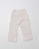 Off White Corduroy cargo pants on a white background.