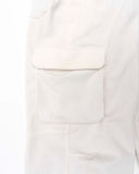 Close-up of a Off White Corduroy cargo pants on a white background.