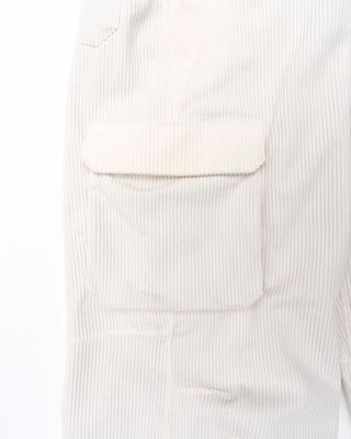 Close-up of a Off White Corduroy cargo pants on a white background.