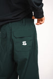 BUSI Biggie Pant Light Green snowboard and ski pants, back view on model