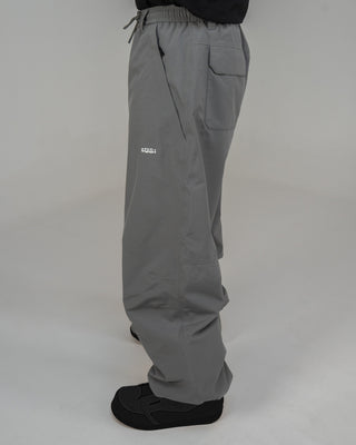 BUSI Biggie Pant Steel Grey snowboard and ski pants, side view on model