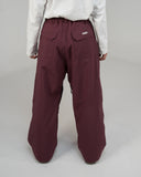 BUSI Biggie Pant Wine snowboard and ski pants, back view on model