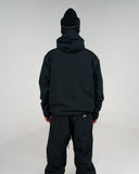 BUSI Core Jacket Black snowboard and ski jacket, back view on model