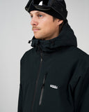 BUSI Core Jacket Black snowboard and ski jacket, front close-up with hood up