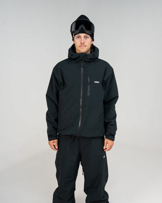 BUSI Core Jacket Black snowboard and ski jacket, front view on model