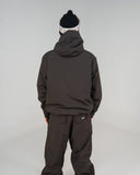 BUSI Core Jacket Brown snowboard and ski jacket, back view on model
