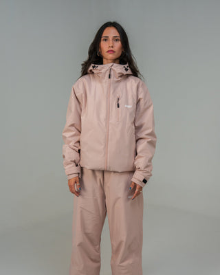 BUSI Core Jacket Dusty Pink snowboard and ski jacket, front view on female model