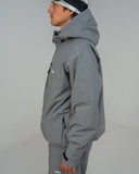 BUSI Core Jacket Steel Grey snowboard and ski jacket, side view with hood up