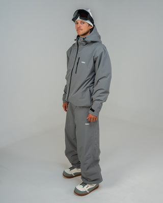 BUSI Core Jacket Steel Grey snowboard and ski jacket, side view on model