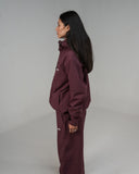 BUSI Core Jacket Wine snowboard and ski jacket, side view on model